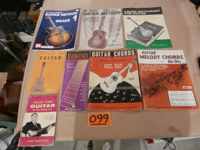lot 99 image: Eight Guitar Instruction & Chord Books