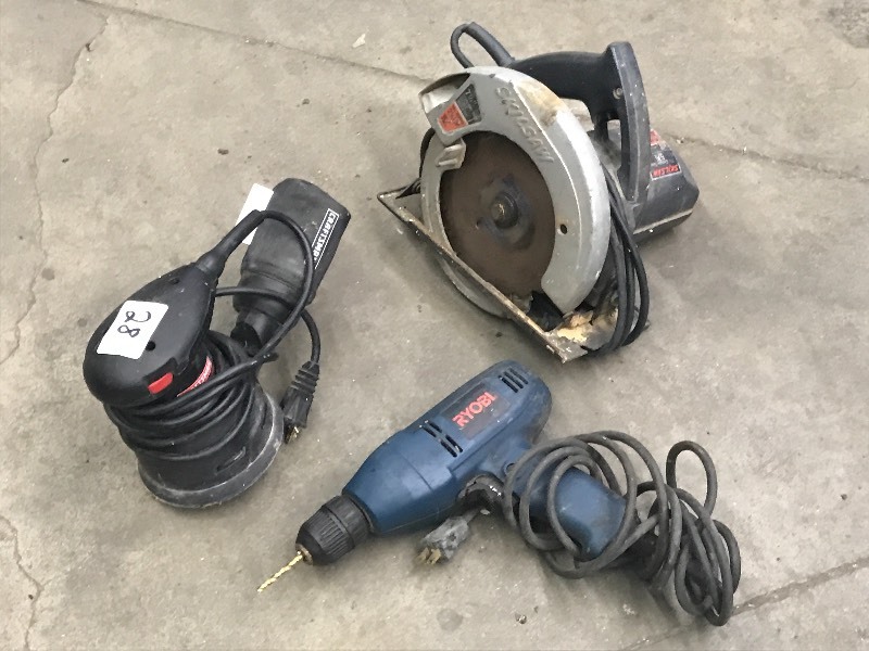 lot 28 image: Skilsaw, Sander, Drill