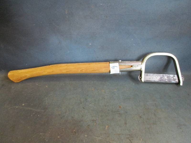 lot 6 image: Bent Fawn Foot Bush Axe