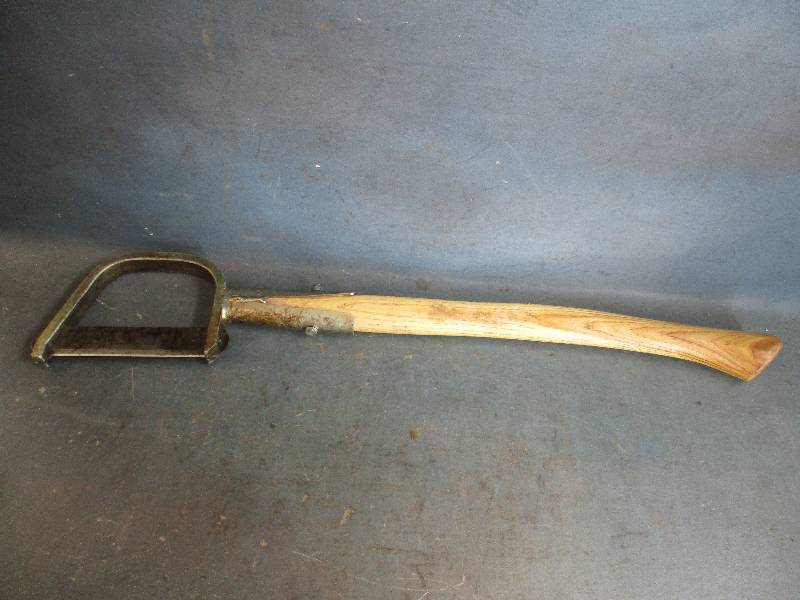 lot 65 image: Bent Fawn Foot Bush Axe