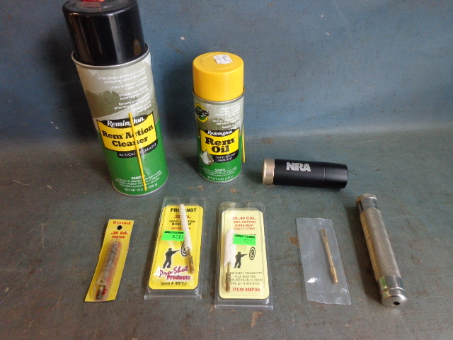 lot 111 image: Gun Cleaning Items and NRA Flashlight