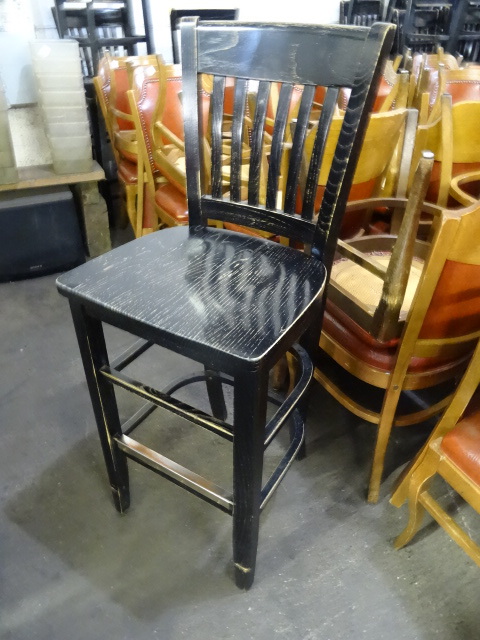 8 wood framed restaurant stools. 30...