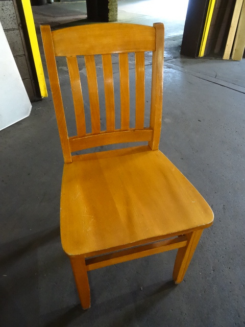 10 wood framed restaurant chairs. ...