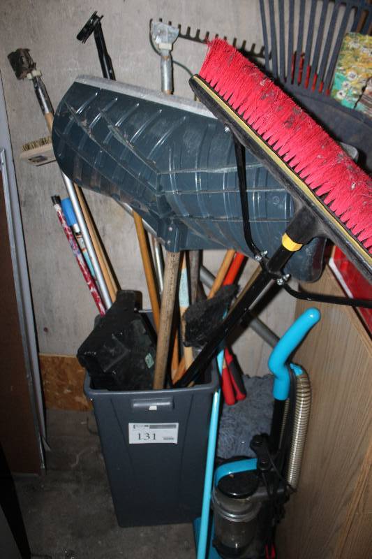 lot 131 image: Plastic Bin of JanitorialYard Tools Includes Rakes, Shovels, Brooms, And More