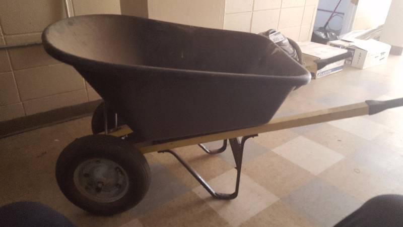 lot 407 image: Truper 2 Wheeled Black Poly Wheel Barrow