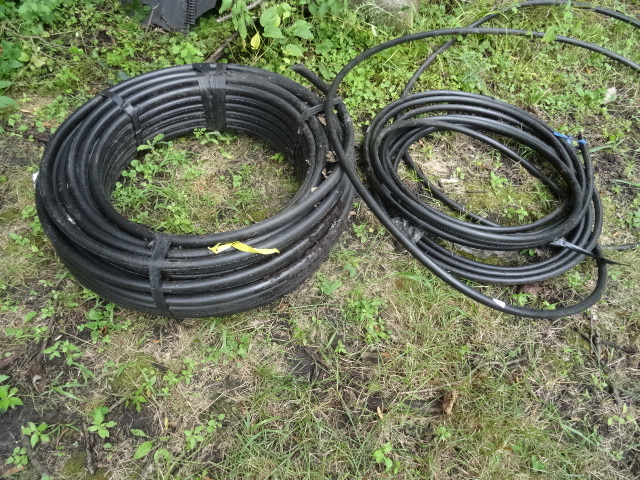 lot 5 image: Roll of 34 and 1 irrigation pipe....
