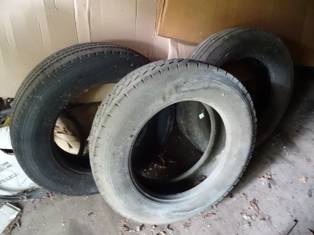 lot 19 image: 3 semi tires. 2 steer and 1 gripper...