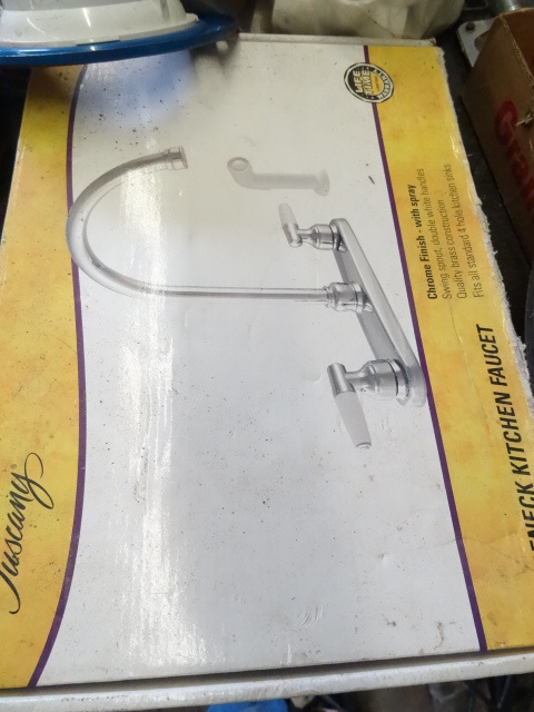 lot 45 image: New kitchen faucet. Misc PVC fittin...