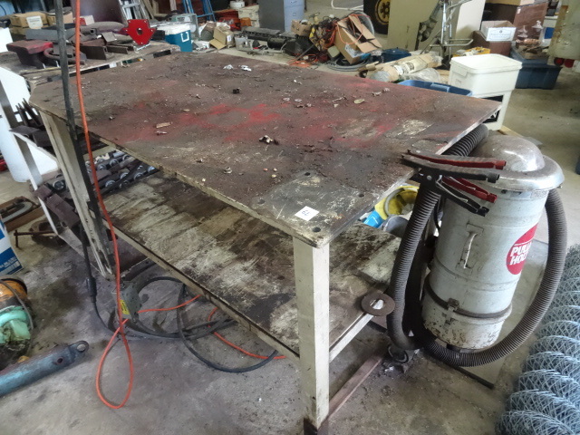 lot 62 image: Heavy duty welding table on wheels....