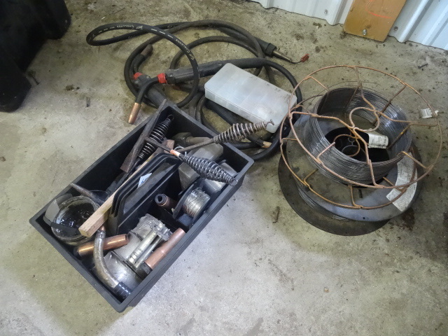 lot 65 image: 2 wire feed welder guns. Rolls of w...