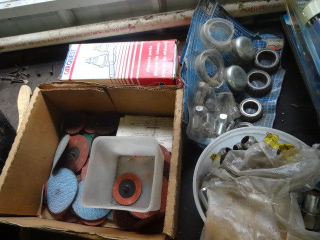 lot 71 image: Trailer bearing kit. Lug nuts. Carq...