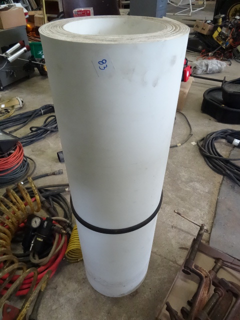 lot 83 image: Roll of plastic material. 38 wide....