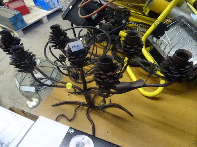 lot 155 image: Metal pine cone candle holder. Meta...