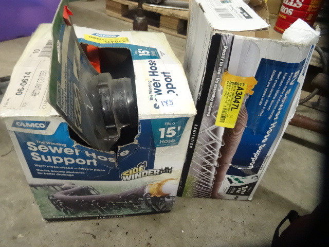 lot 185 image: Camco RV sewer hose supports. Qty 2...