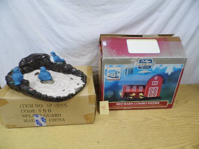 lot 34 image: Downspout Splashguard - Bird Feeder