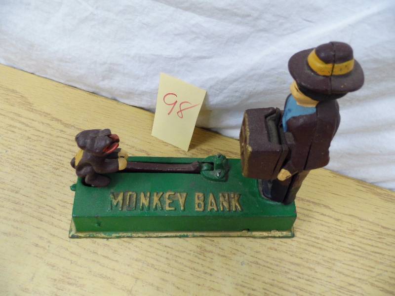 lot 98 image: Cast Iron Monkey Bank