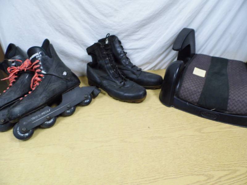 lot 122 image: Booster Seat - Rollerblades
