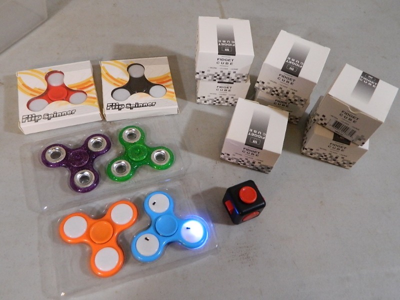 lot 73 image: New Fidget Spinners and Cube Spinners