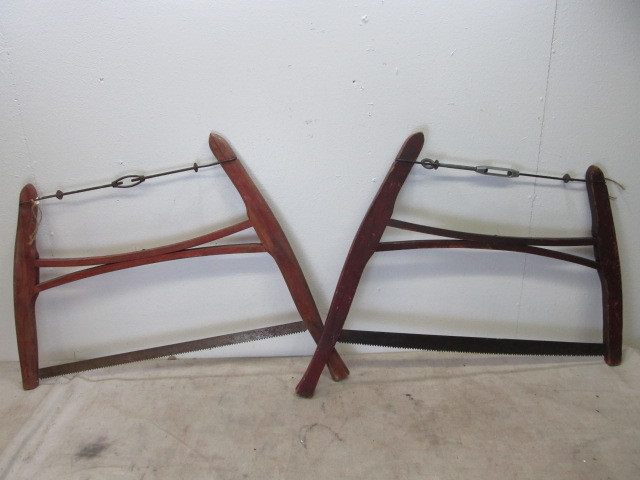 lot 20 image: Pair of Antique Red Painted Buck Saws