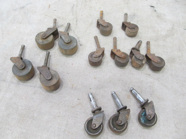 lot 55 image: Antique Wood & Metal Wheel Casters