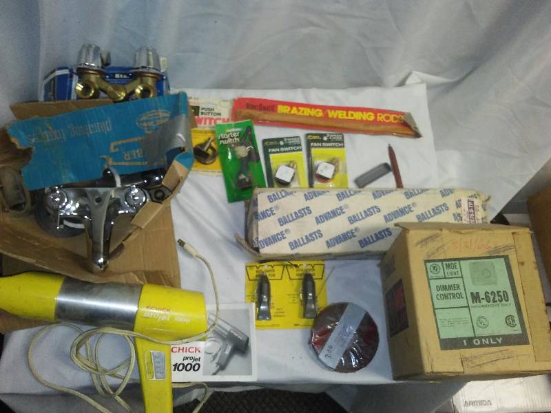 lot 26 image: Shower and Lavatory Fixture, (new in box) Switches, Welding Rods, Dimmer Switch and more