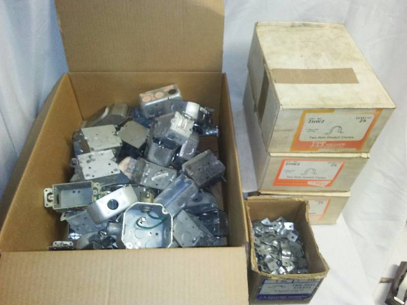 lot 39 image: Metal Boxes, Conduit Clamps, and 2-hole Straps