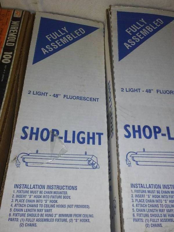 lot 45 image: Shop Lights (2) New in Box, Plug Mold Track and Base, Singer Quartzone Tube Heater