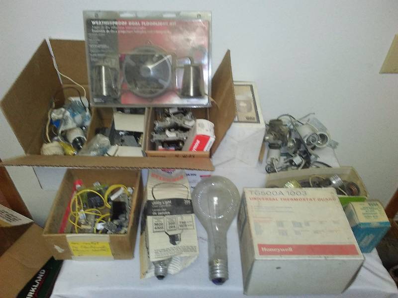 lot 63 image: Light fixtures, jumbo lightbulbs, switches and porcelain lamps