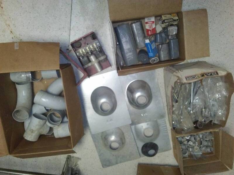 lot 74 image: Capacitors, Galvanized Bolts and Nuts, Sewer Vent Roof Covers (4) and Conduit Pieces