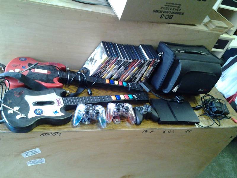 lot 36 image: PS2 Slim With 19 Games, Power Cords, Controller, 2-Guitars
