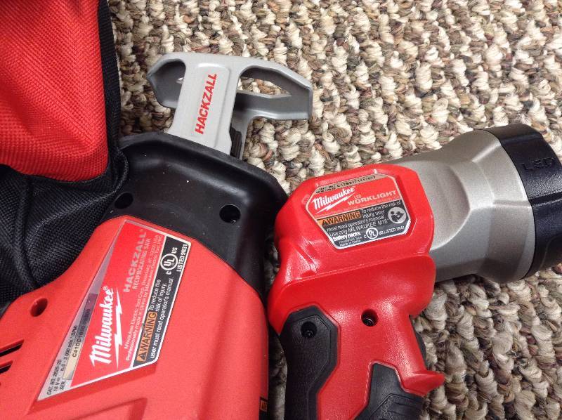 Set of 4 Milwaukee Tools M18 Hackzall LED Worklight and Brushless hammer drill driver and impact driver 1 4.0 hr Batterie and Charger