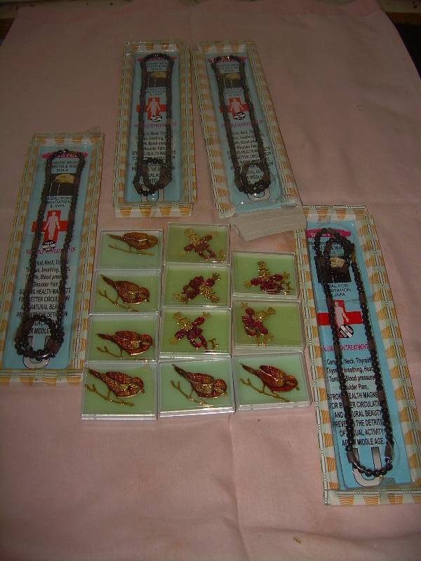 lot 6 image: PINS BIRDS AND CLOWNS MAGNETIC NECKLACES