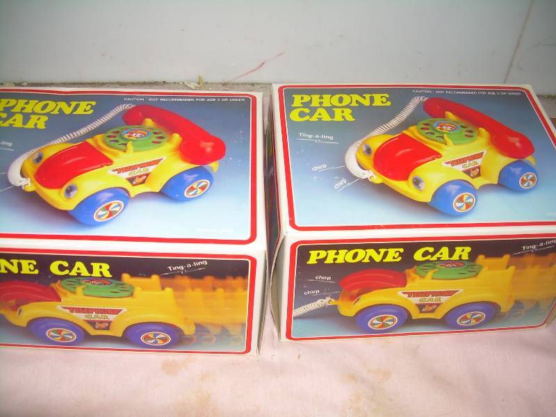lot 24 image: 2 PHONE PHONE CARS AND 2 PLAY GROUND CLOCKS
