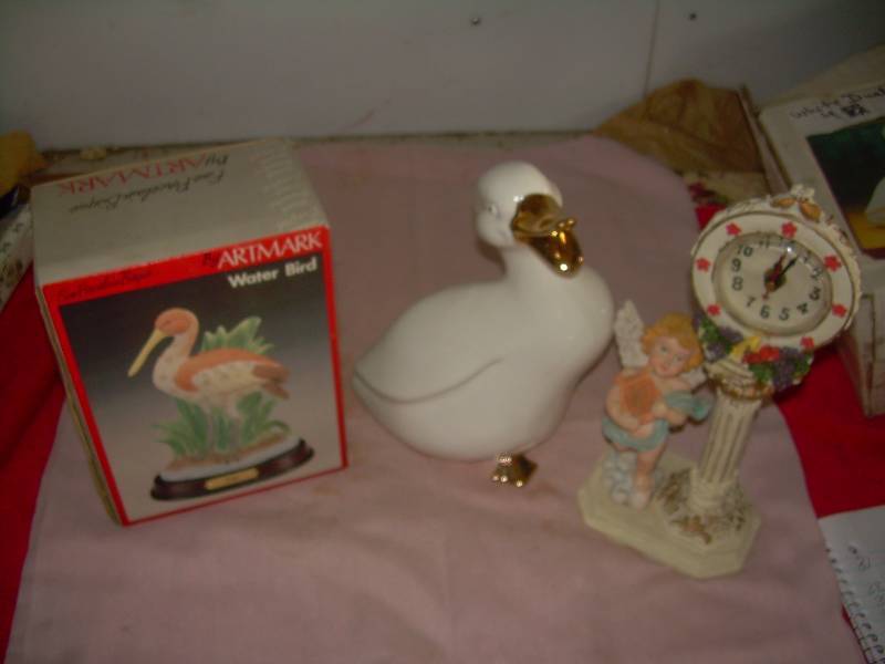 lot 44 image: WATER BIRD , DUCK ,AND A CLOCK