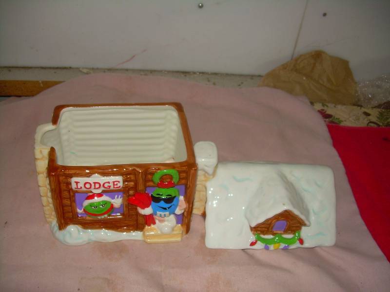 lot 45 image: COLLECTIBLE M AND M COOKIE JAR