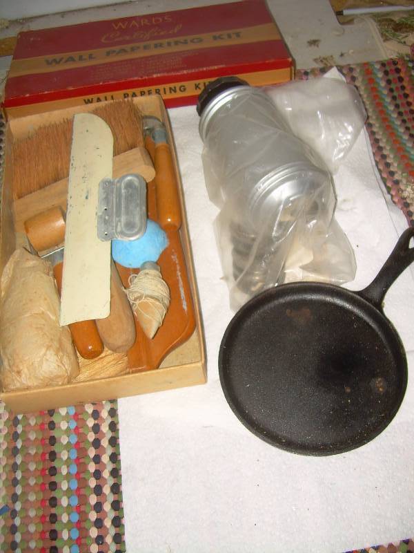 lot 133 image: ANTIQUE WALL PAPER KIT , SMALL CAST IRON PAN , COOKIE SHOOTER