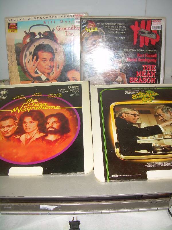 lot 143 image: RCA VIDEO DISK PLAYER AND MOVIES