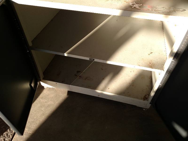 lot 51 image: 2 Door Cabinet, 31x24x27...