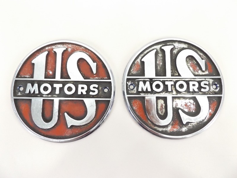 2 Vintage US Motors Metal Plaques