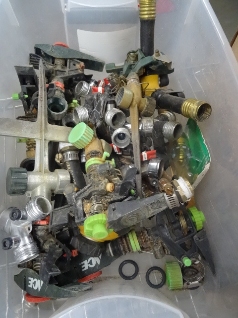 Box and bucket full of sprinklers...