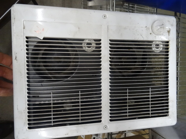 In wall dual fan electric heater. ...