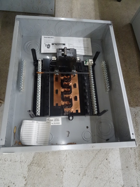 100 AMP Siemens load center. No cov...