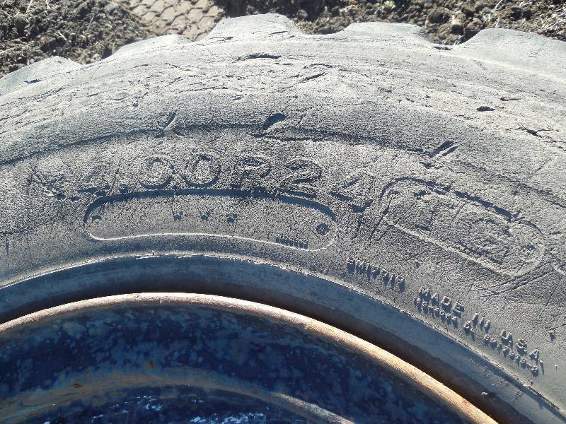 lot 26 image: 4 TIRES 14.00 X 24 WITH RIMS