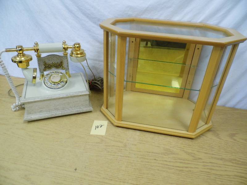 lot 102 image: Display cabinet - Phone