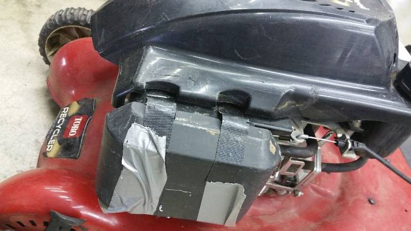 lot 734 image: Toro GTS 20 Gas Powered Push Mower 7.oft-lbs net torque