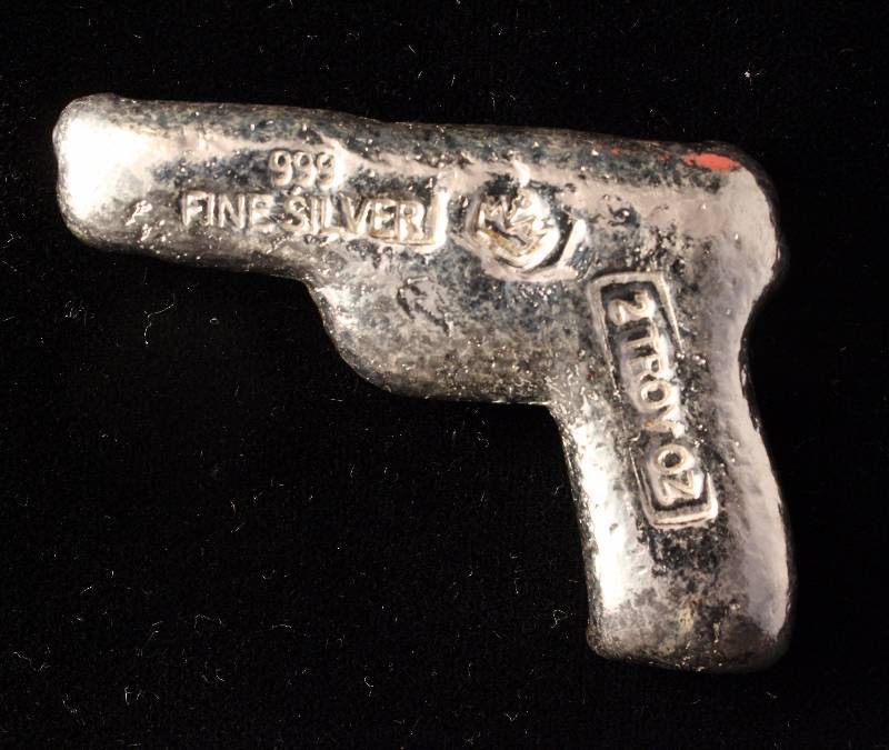 lot 19 image: 2 TROY OZ. .999 FINE SILVER GUN - MONARCH PISTOL