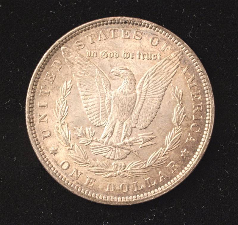 lot 45 image: 1889 MORGAN SILVER DOLLAR AU NICELY TONED