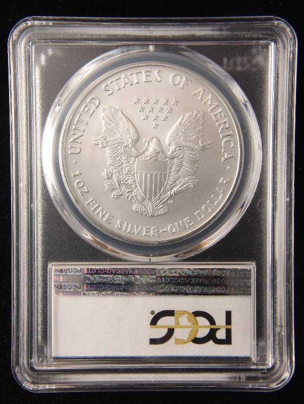 lot 136 image: 2005 AMERICAN SILVER EAGLE 1 TROY OZ. .999 FINE SILVER MS69 PCGS