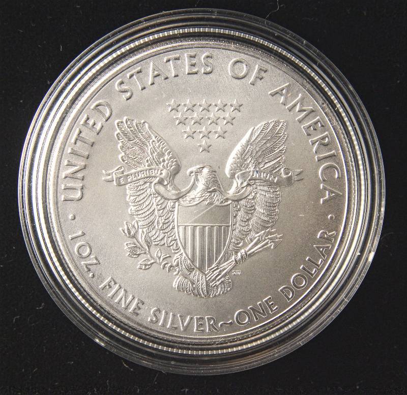 lot 135 image: 2013 AMERICAN SILVER EAGLE 1 TROY OZ. .999 FINE SILVER DOLLAR IN AIRTITE CAPSULE