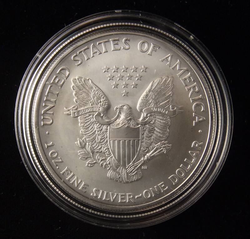 lot 156 image: 2003 AMERICAN SILVER EAGLE 1 TROY OZ. .999 FINE SILVER DOLLAR IN AIRTIGHT